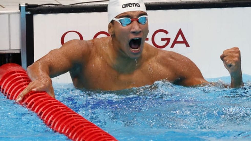 Tunisian teenager wins surprise Olympic swimming gold