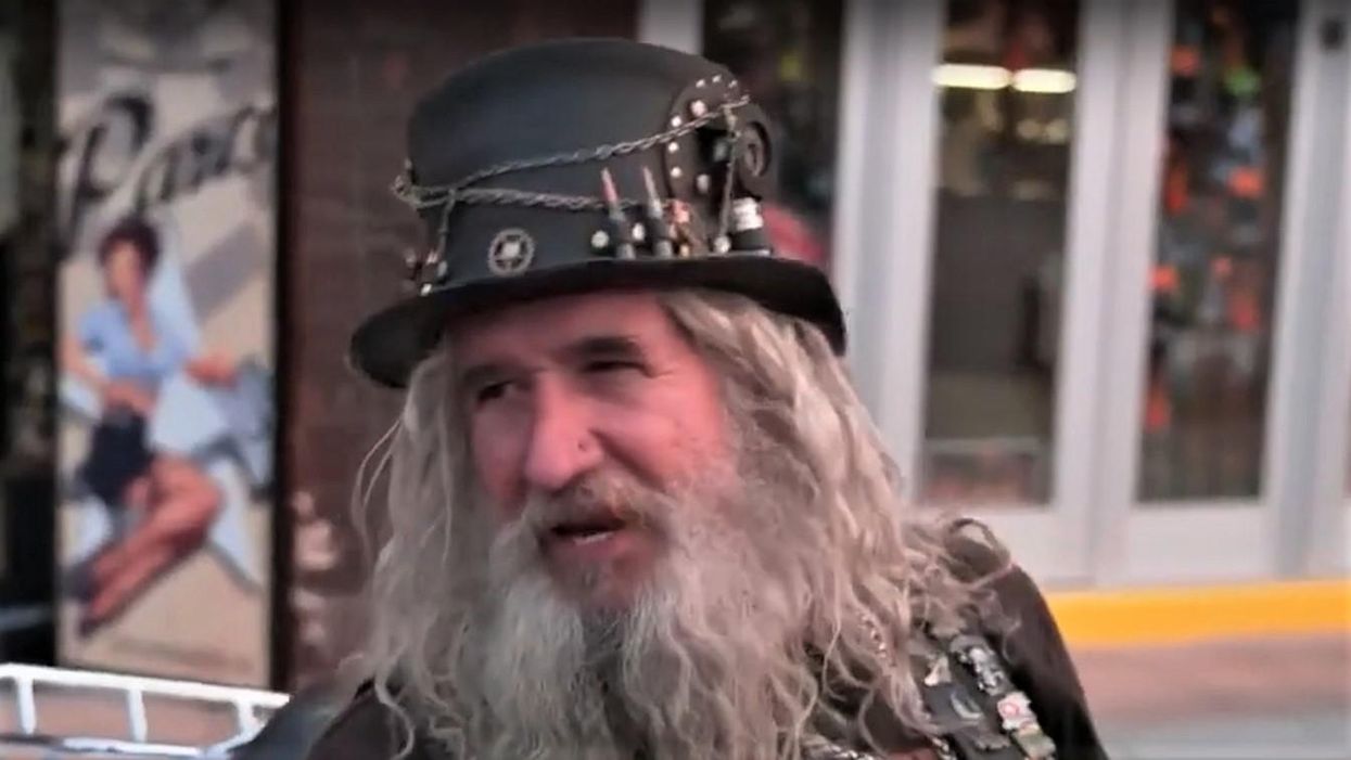 WATCH: Sturgis biker bursts out coughing as he tells CNN why he won’t get the COVID vaccine