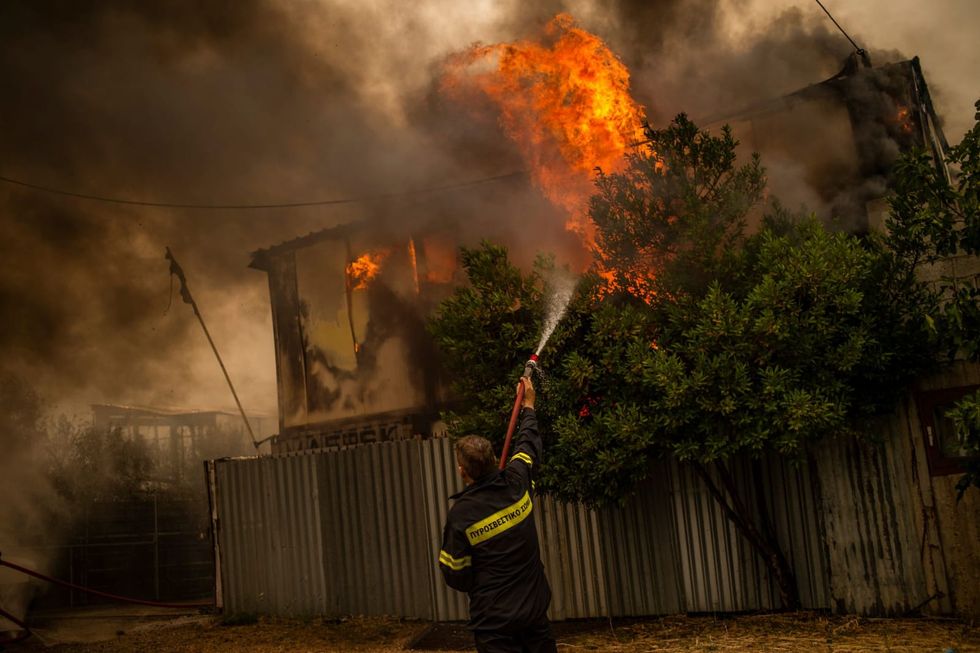 Four fronts rage in north of Athens as wildfires stalk Greece