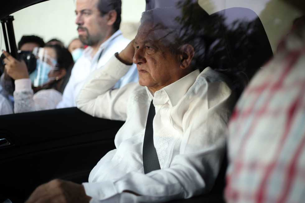 Mexican president stuck in car by protest for more than two hours