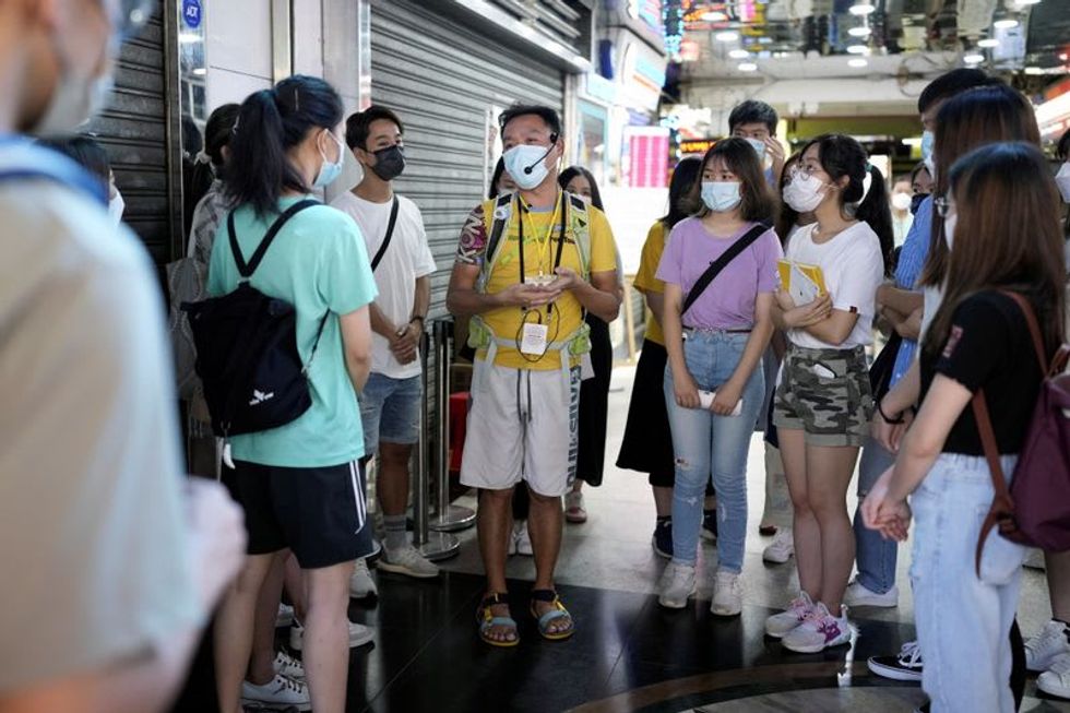 Drag queens and refugee stories: touring the ‘real’ Hong Kong