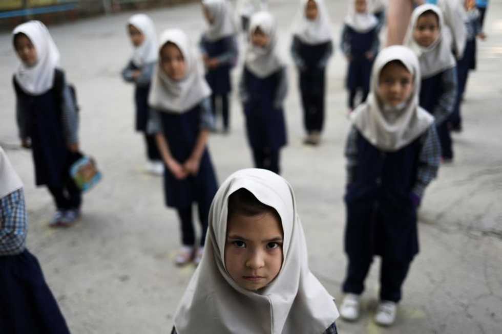 Some Afghan girls return to school, others face anxious wait