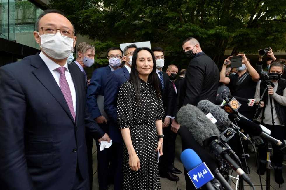 China welcomes Huawei executive home, but silent on freed Canadians