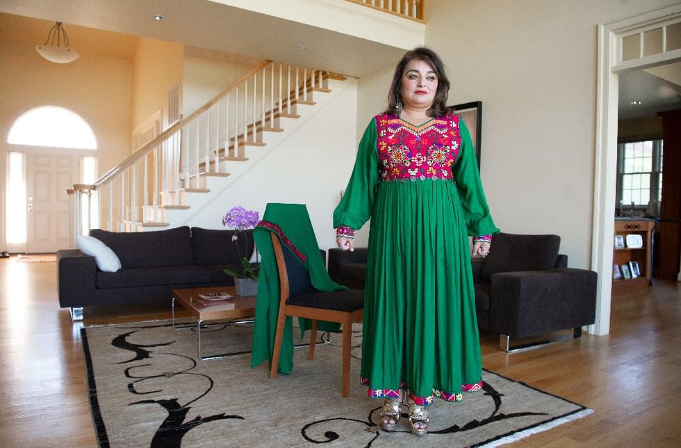 Social media campaign highlights colorful Afghan clothing to protest Taliban dress code
