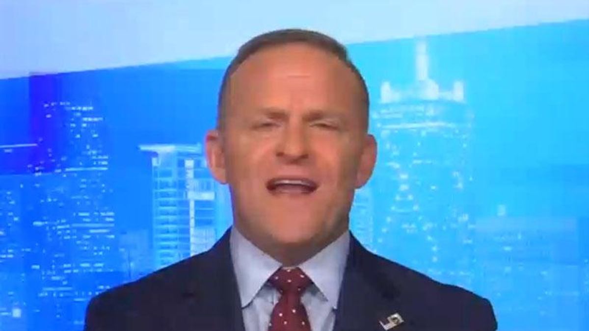 WATCH: Newsmax host goes on racist rant accusing Biden of ‘waging war’ to ‘dilute’ the suburbs