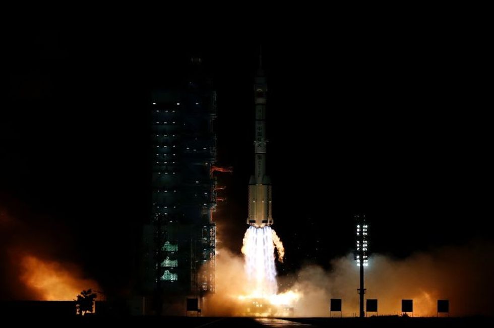 China launches second crewed mission to build space station