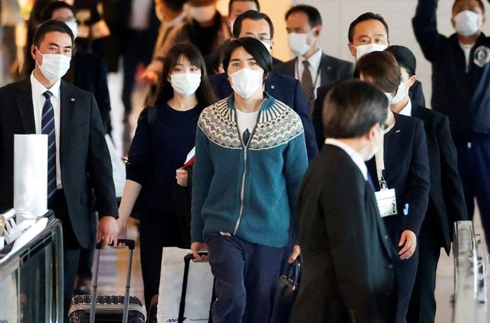 Japan's ex-princess Mako and new husband depart for life in US