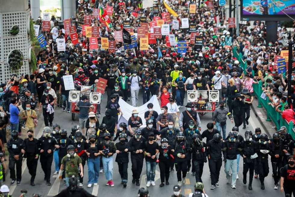 "No absolute monarchy:" Thousands of Thais march for royal reforms