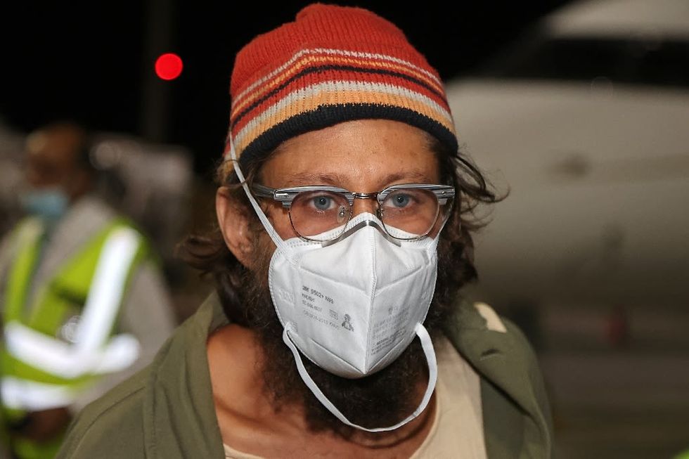 Freed US journalist says not 'beaten' in Myanmar jail ordeal