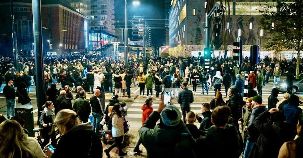 Dutch police fire warning shots as COVID riots hit Rotterdam
