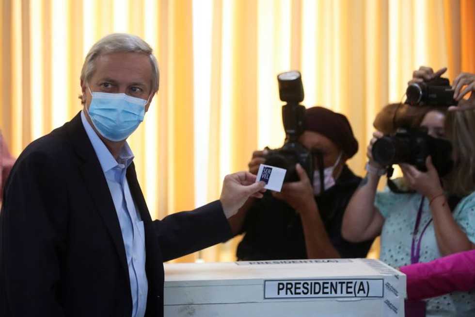 Chileans head to the polls with two radically different visions on the ballot