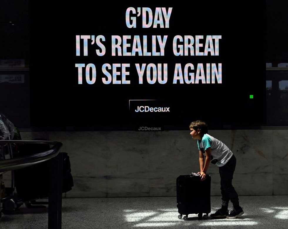 Australia to reopen to foreign visa holders in bid to revive economy