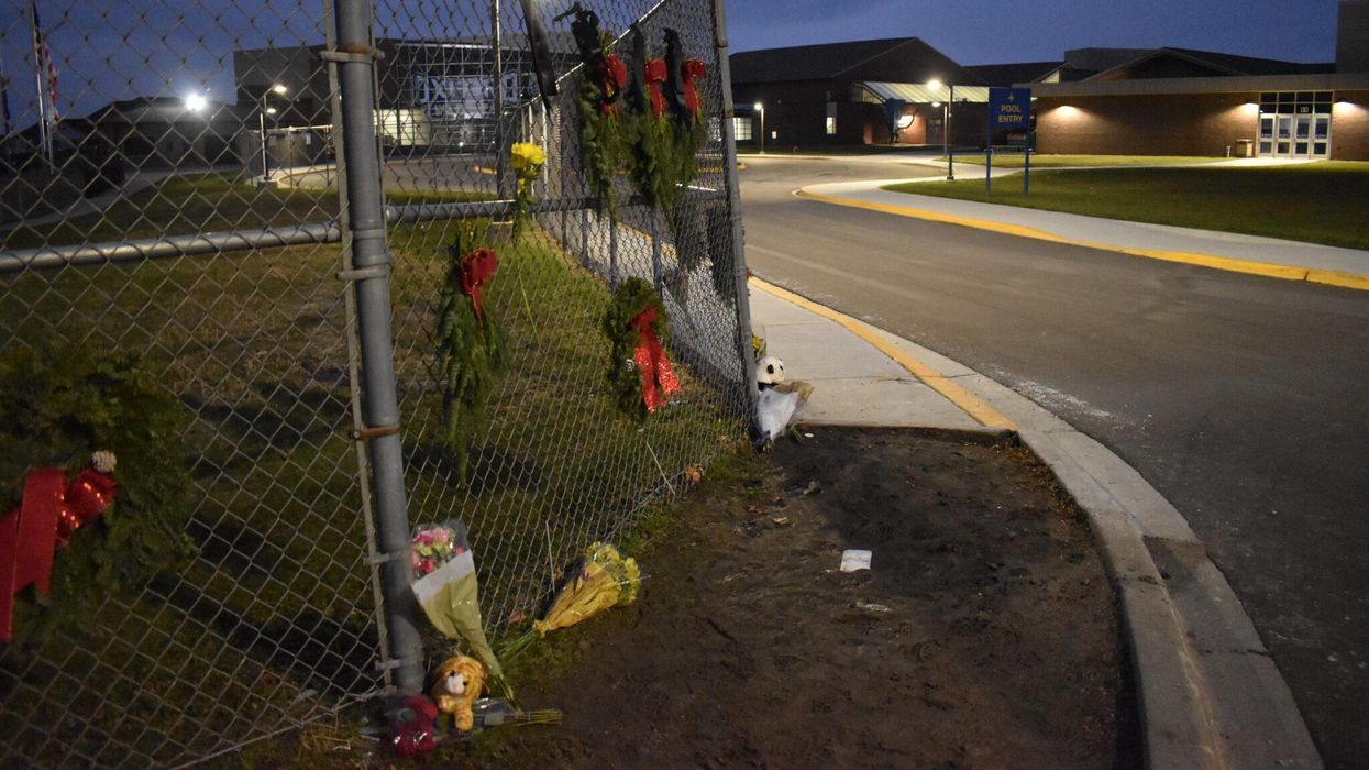‘We will not be defined by this tragedy’: Thousands mourn four Oxford students during vigil