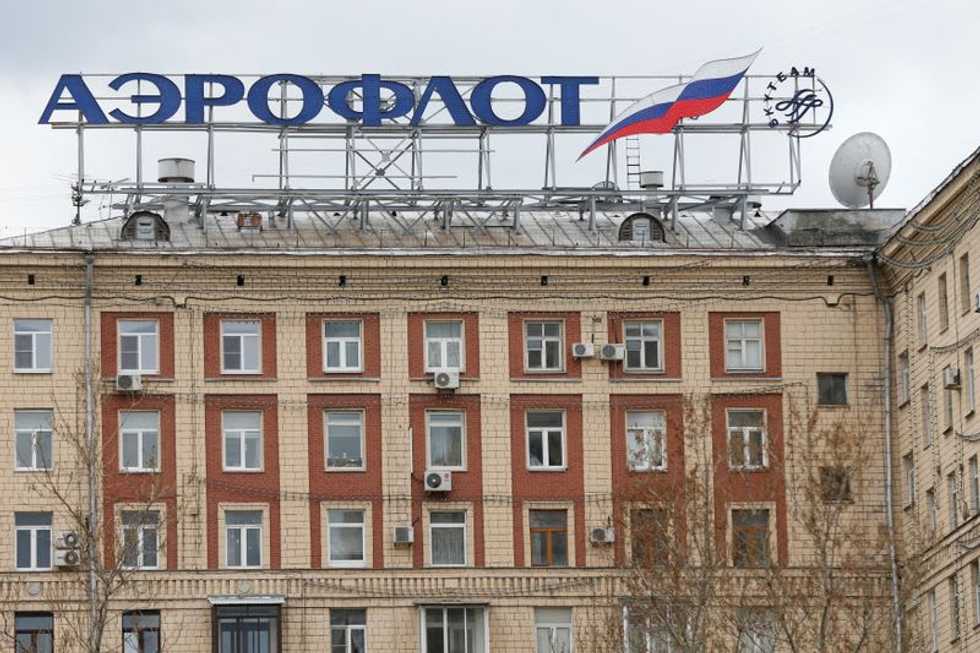 Russia says airliner had to lose height to avoid NATO spy plane