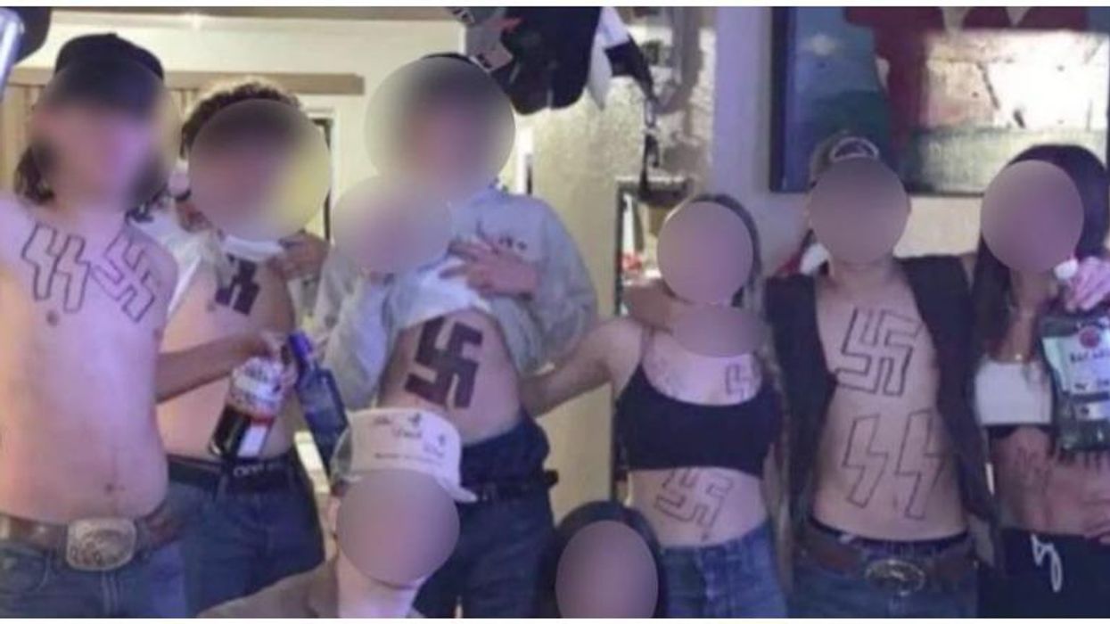 Shocking photo shows California high school students covered in swastikas