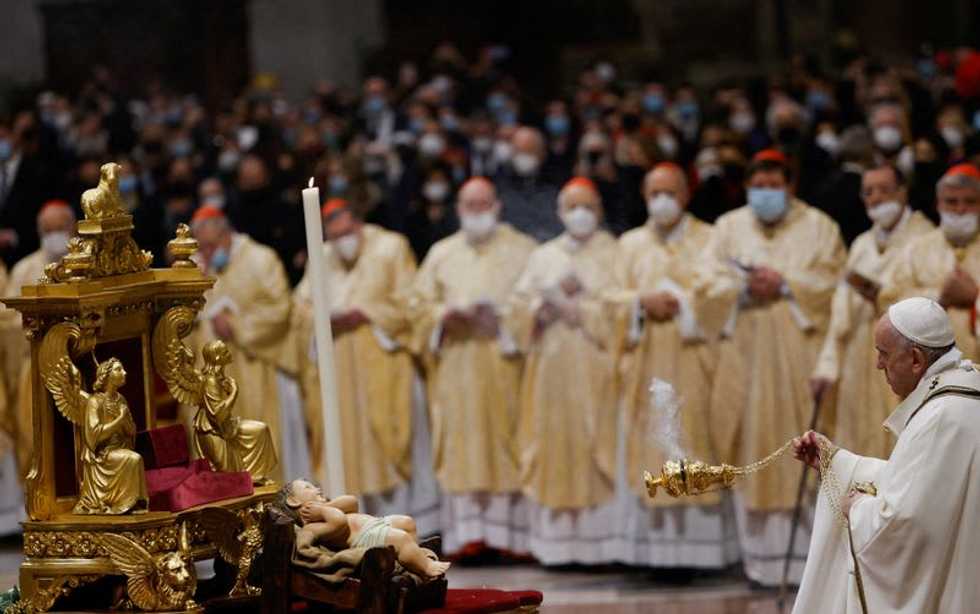Look beyond the lights and remember the poor, pope says on Christmas eve
