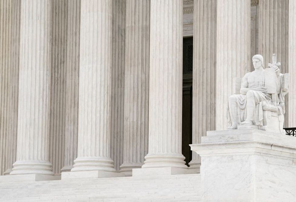 Louisiana governor pardons plaintiff in landmark Supreme Court racial segregation case