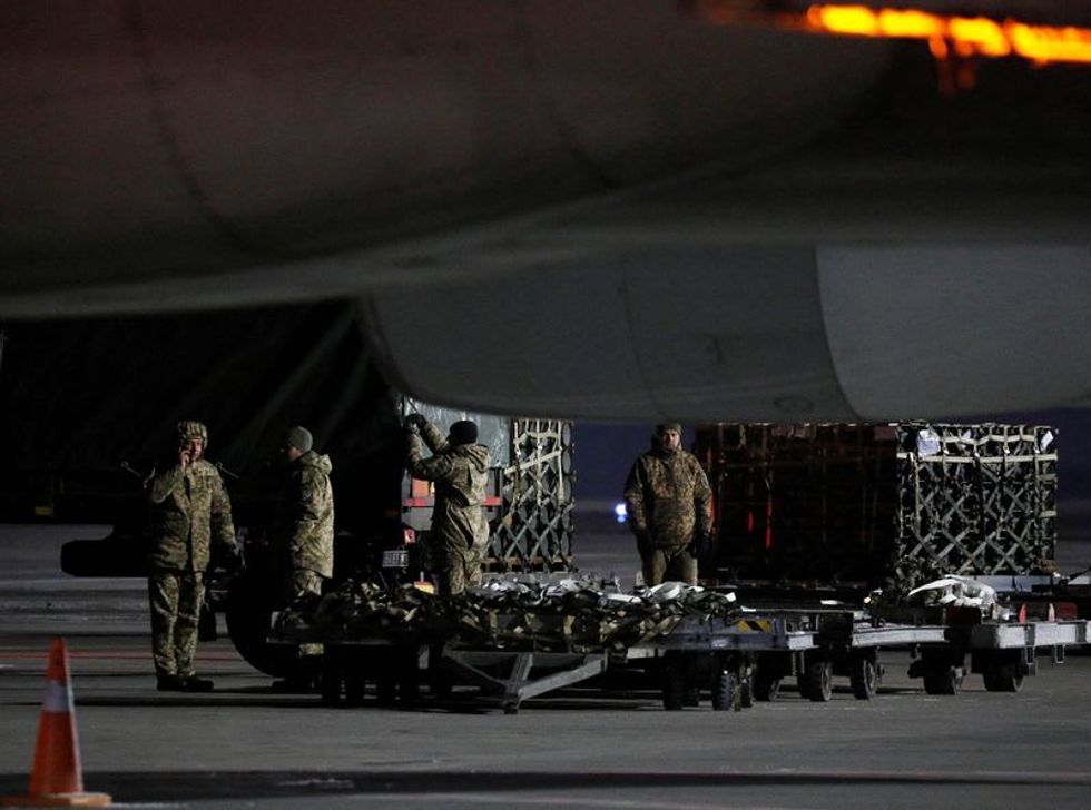 Biden warns Putin with sanctions as West steps up Ukraine defenses