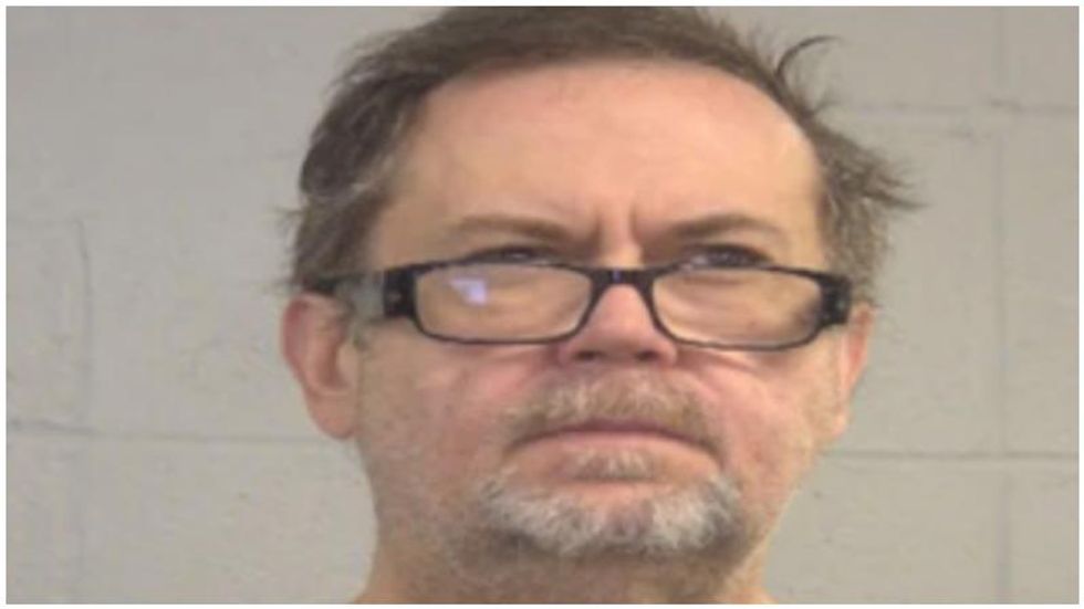 Man charged with hiding his mother's dead body on his back porch for more than a year