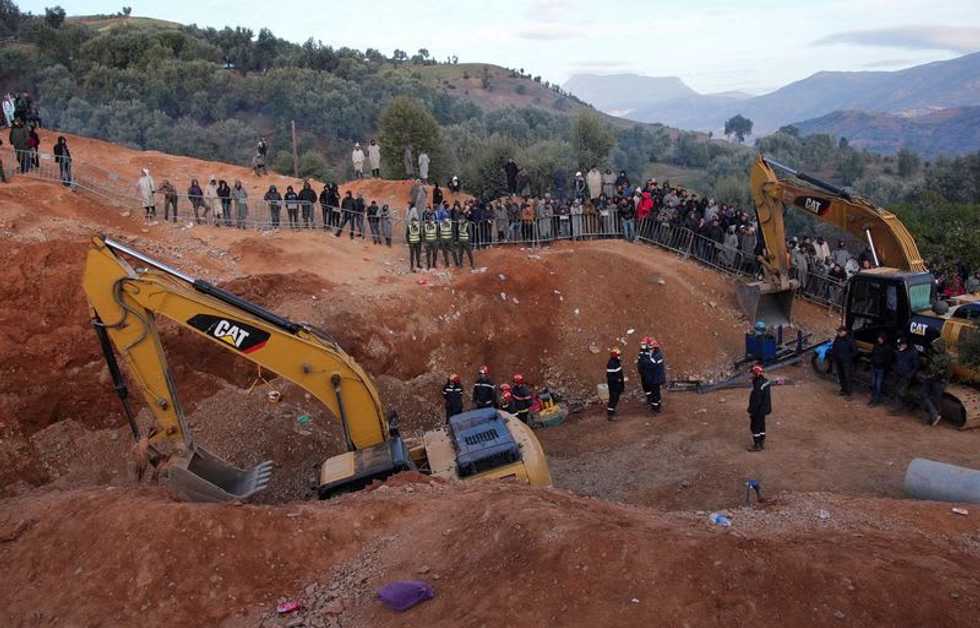 Moroccan rescuers dig toward child trapped in well