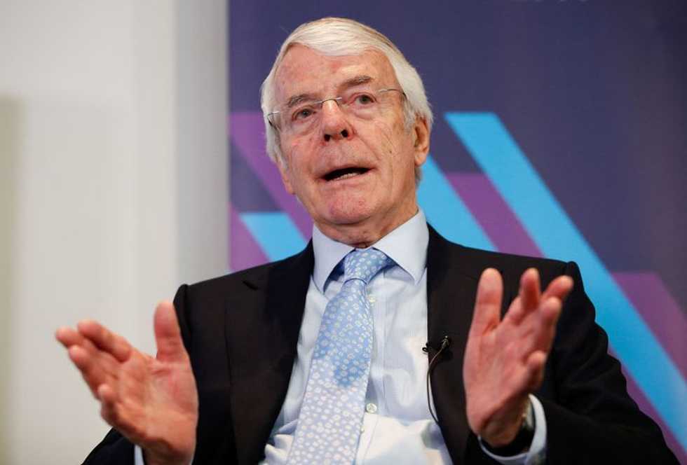 Ex-British PM says Johnson broke the law over parties