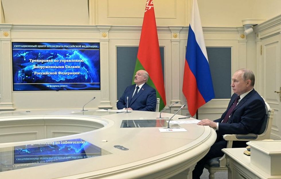 Putin launches nuclear drills as US says Russia poised to invade Ukraine