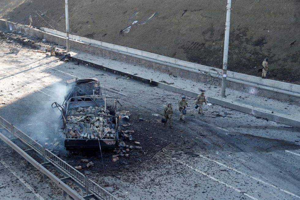 Ukrainian oil and gas facilities burn as West prepares new sanctions