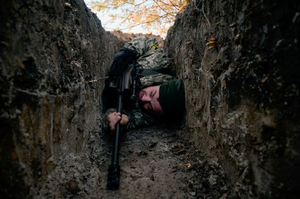 Russian forces regroup on outskirts of Kyiv after setbacks