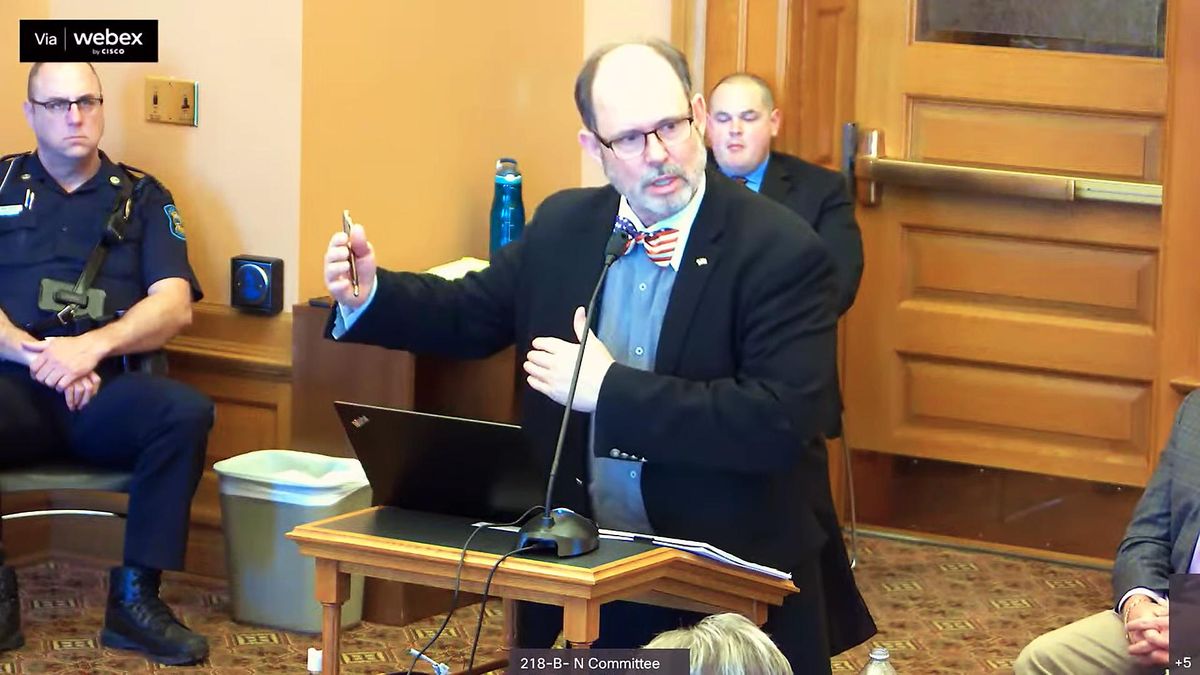 Big Lie huckster peddles bogus election conspiracies with Kansas lawmakers at Topeka church