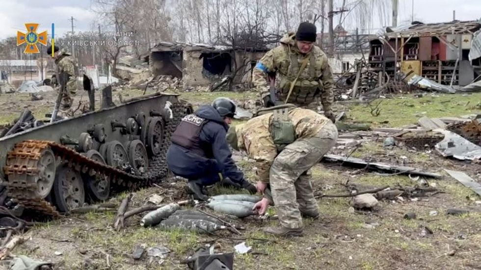 Russian forces pound key cities as West prepares new sanctions