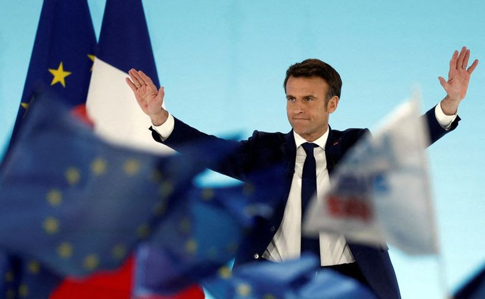 France's Macron heads to Le Pen stronghold in search of more votes
