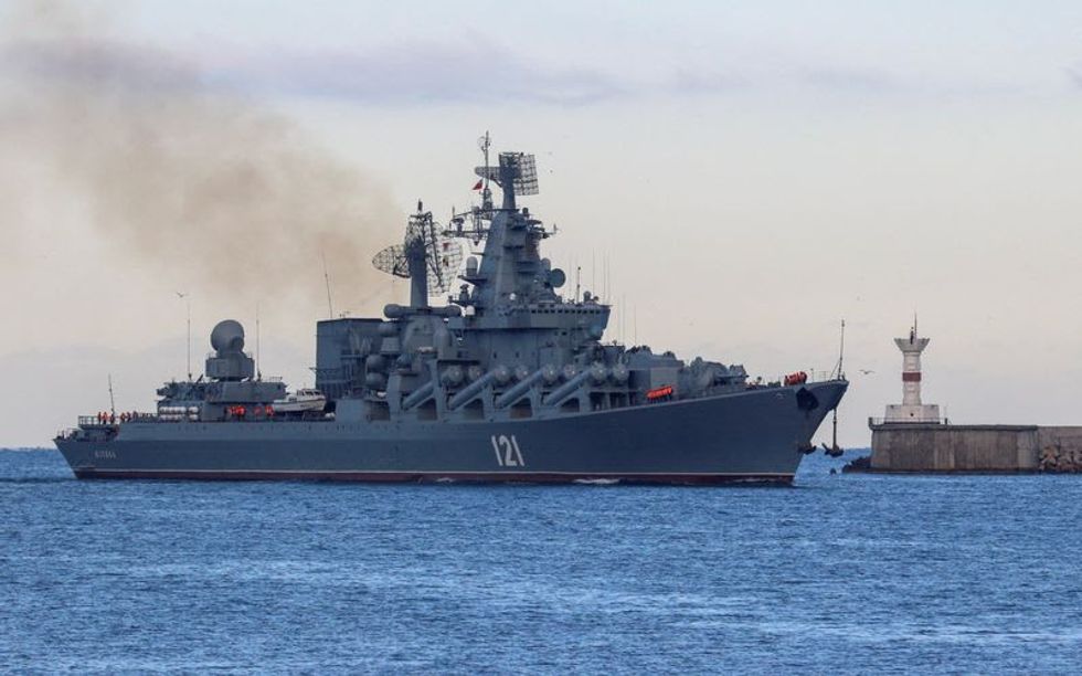 Russia says blast cripples Black Sea flagship, Ukraine claims missile strike