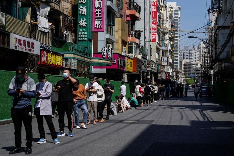 COVID-shaming pits neighbour against neighbour in locked-down Shanghai
