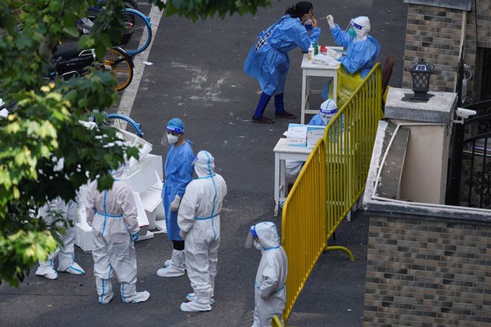 Setback for Shanghai's COVID battle; Beijing focus on mass testing