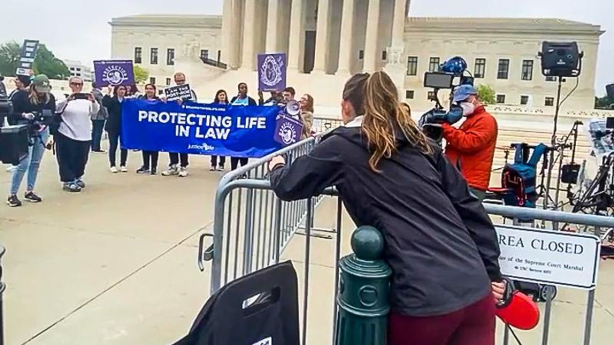 'I would have died without this!' Lone woman stands up to throng of anti-abortion activists at Supreme Court