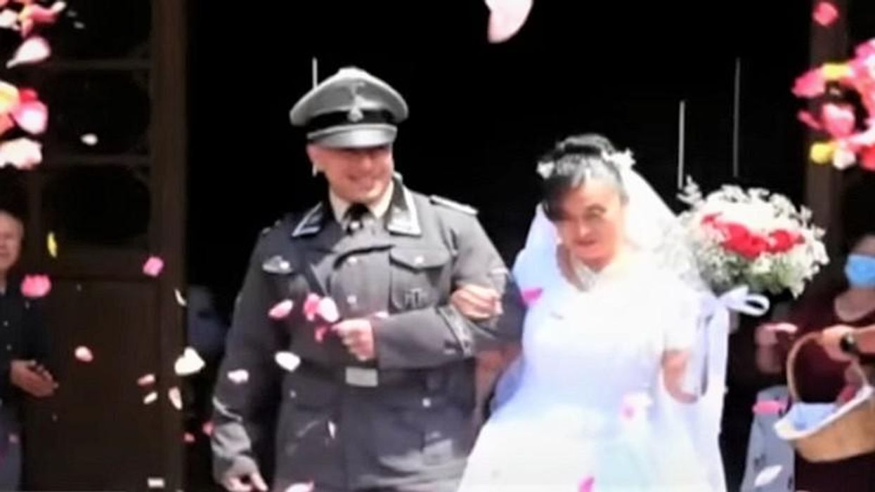 Couple's Nazi-themed wedding where they dressed as Hitler and Eva Braun draws international outrage