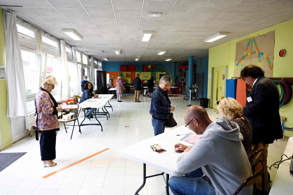 Election setbacks force French president's allies out of office