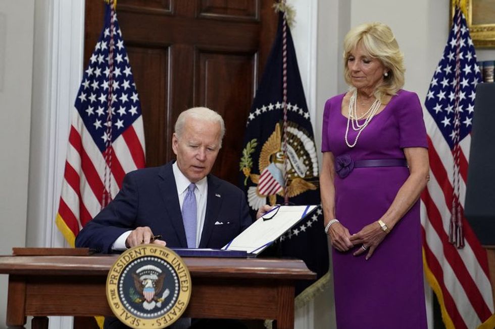Biden signs bipartisan gun safety bill into law