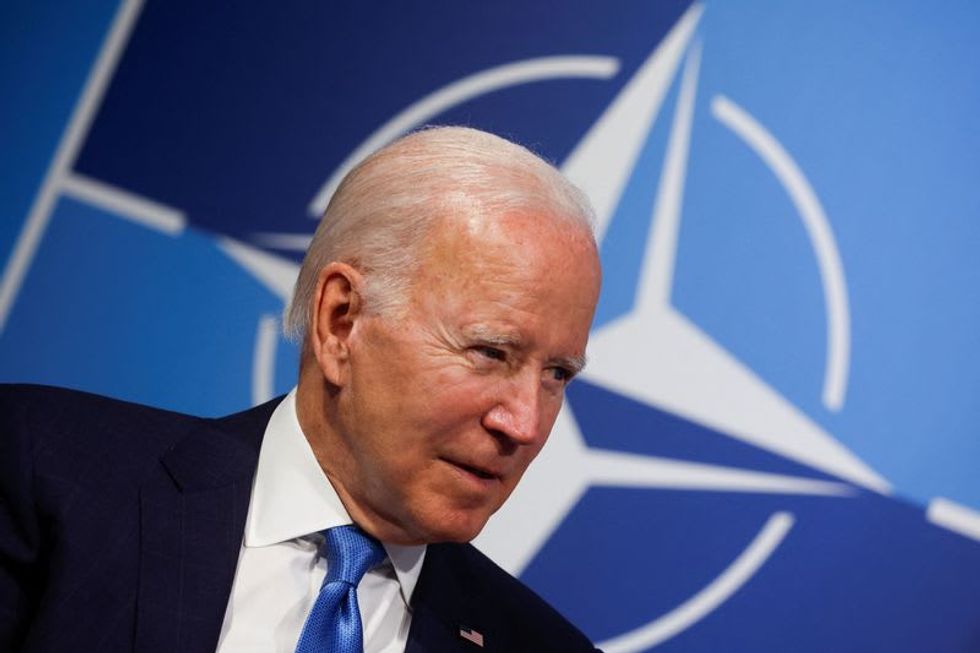 Citing Russia threat, Biden to ramp up U.S. forces in Europe