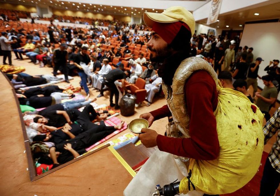 Sadr's followers set up for long sit-in at Iraq parliament