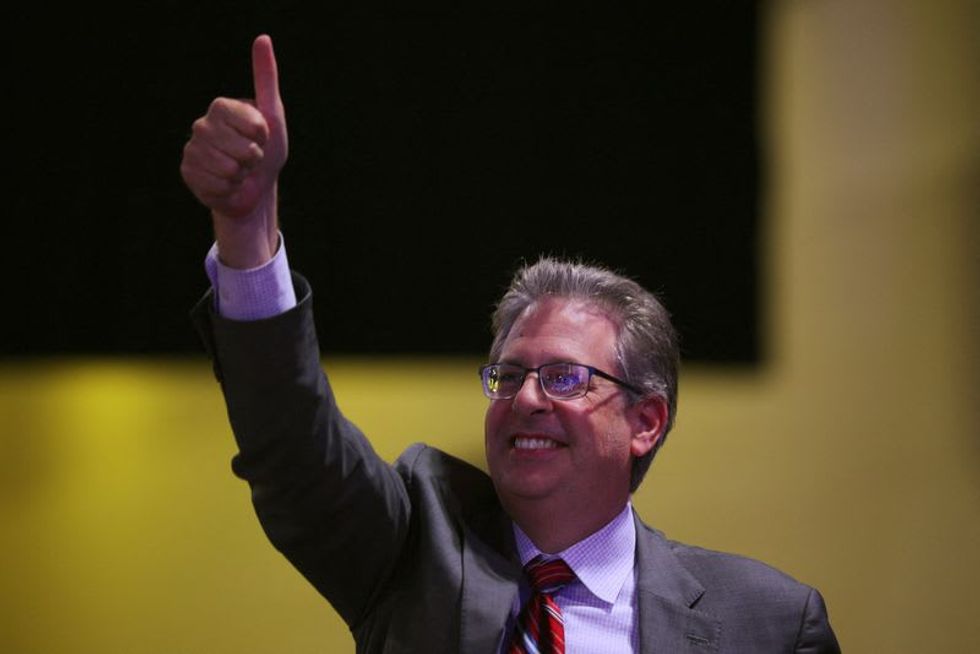 Michigan AG details Trump backers' conspiracy to break into voting equipment