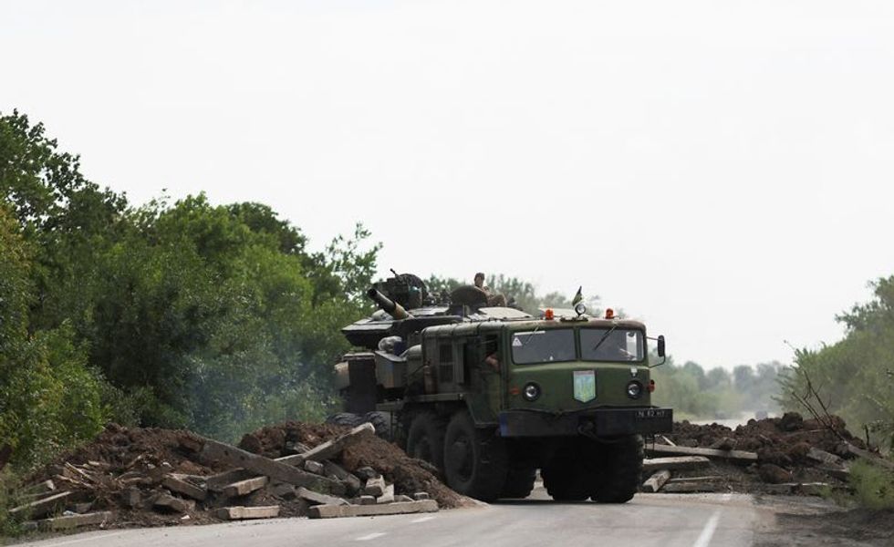 Russians, Ukrainians again trade blame for new shelling near nuclear power plant