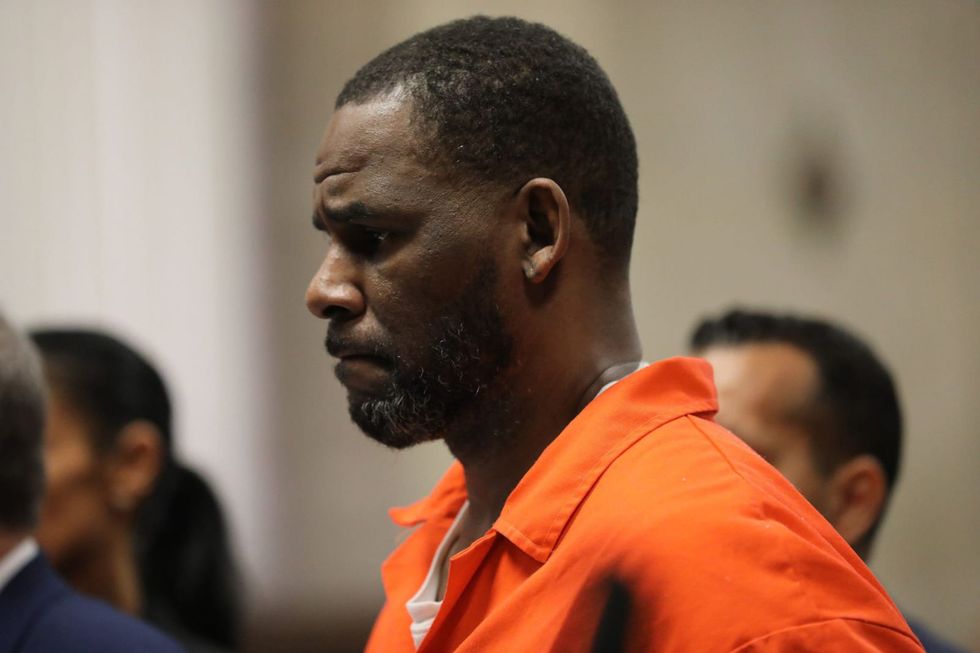 R. Kelly opening statements begin with prosecutors alleging singer had sex with children and attempted a cover-up