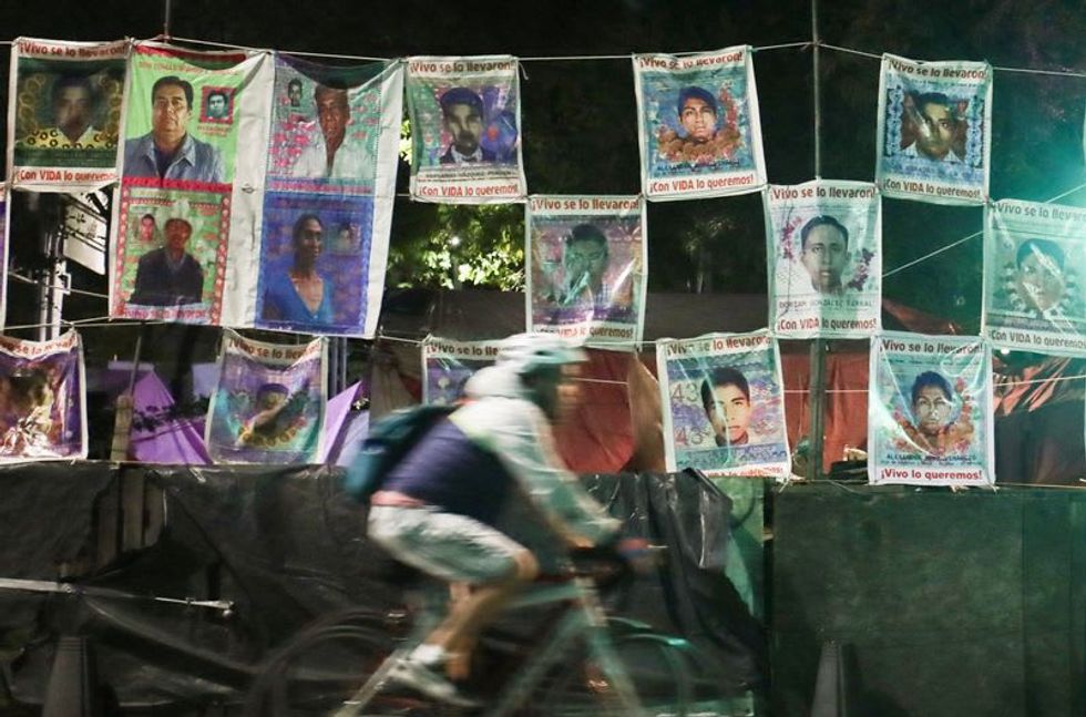 Mexico arrests former top prosecutor in 2014 missing students case