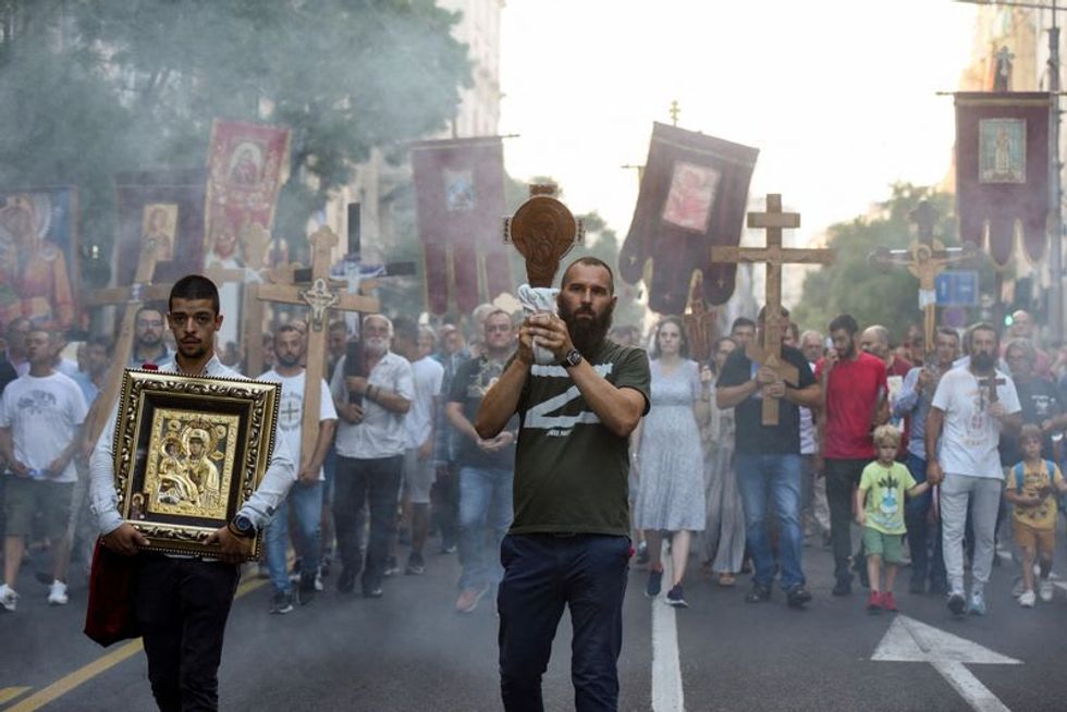 Protesters march in Belgrade against planned gay Pride event