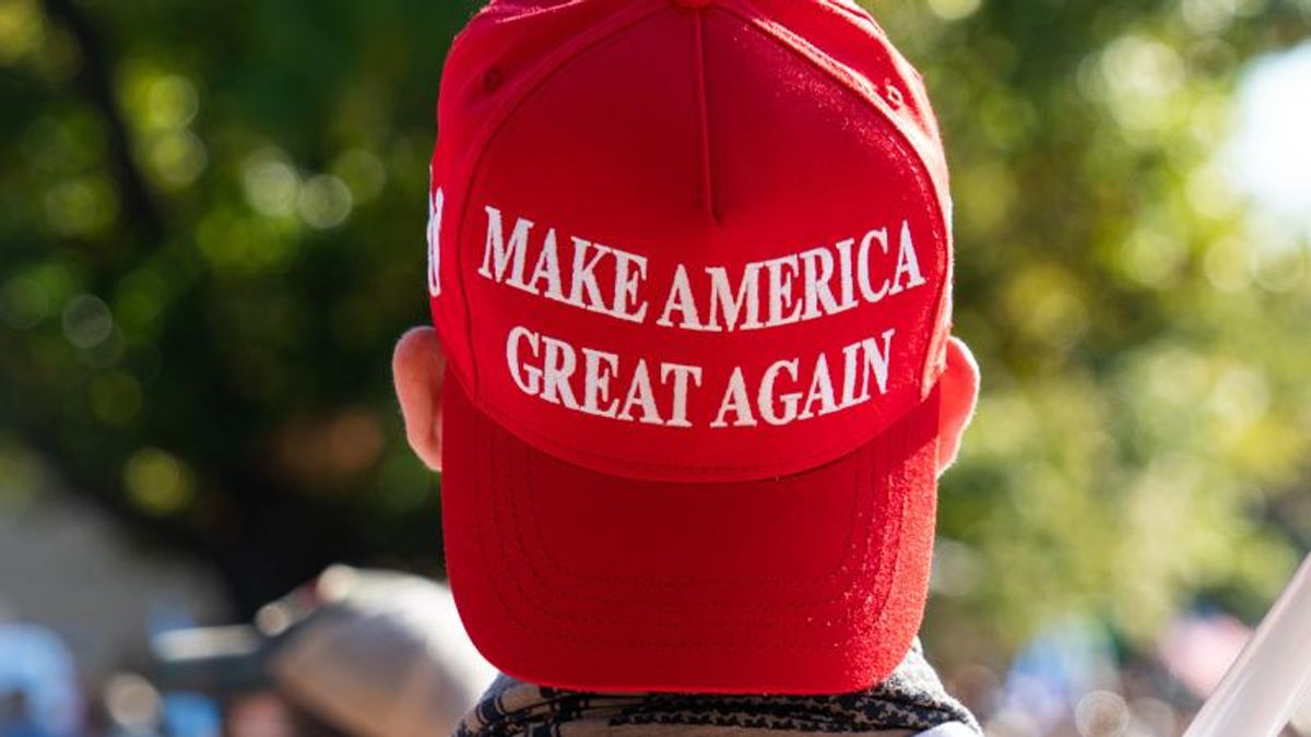 'Neighbor from hell': Trump fan terrorizes local woman by hanging mutilated dolls and pro-gun posters on his fence