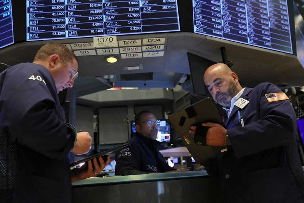 Wall Street rebounds as yields slip, focus on Fed path
