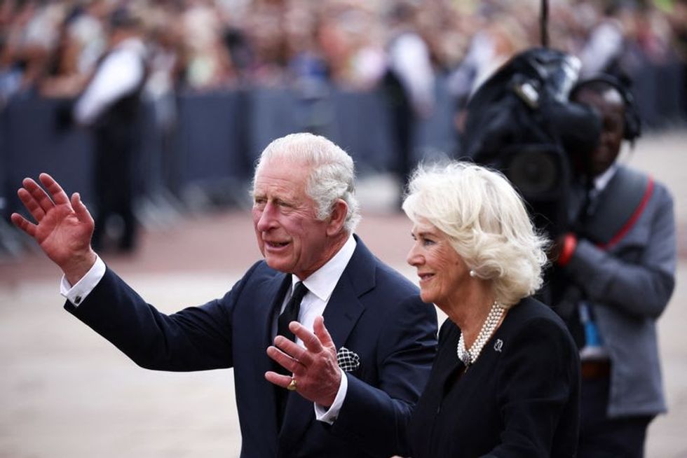 King Charles vows to serve his nation as Britain mourns late queen