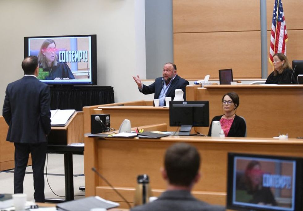 Alex Jones lashes out at critics at trial over Sandy Hook hoax claims