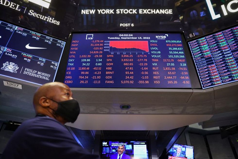 Wall St slumps as investors fret on rate hikes and recession